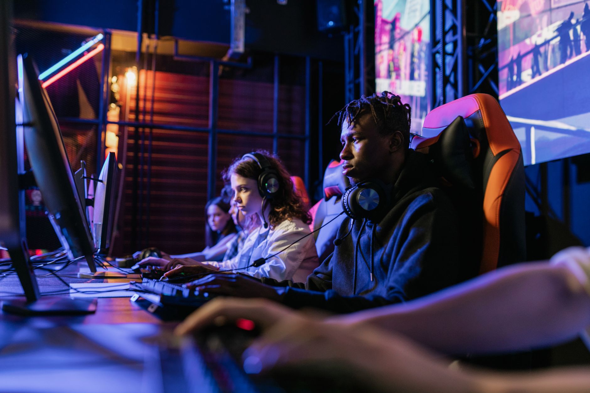 Serious gamers engage in a competitive esports event, highlighting focus and teamwork. — Best Online Casino Australia Overvie