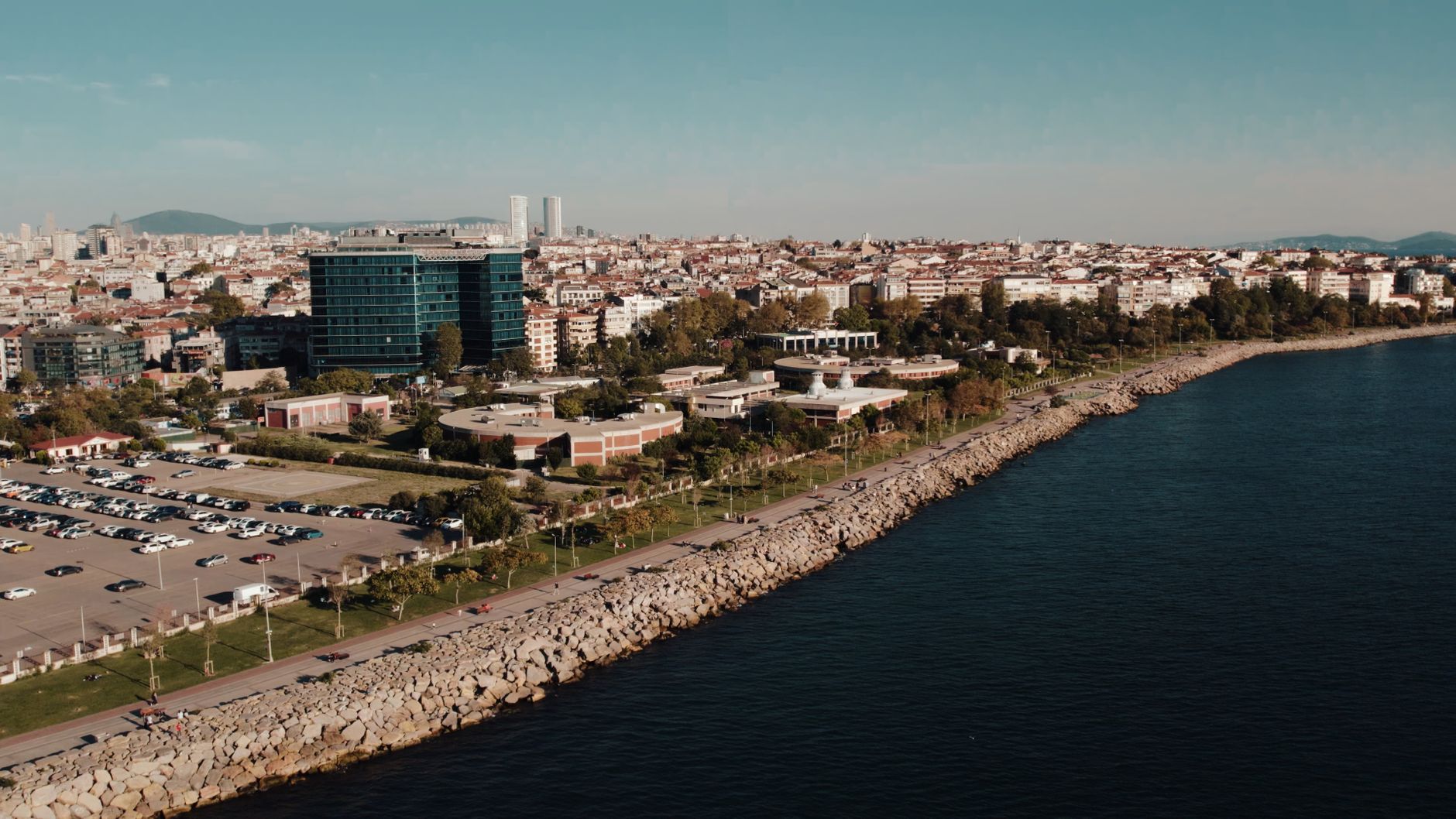 Aerial drone view of Istanbul's seaside cityscape featuring urban architecture and the Bosphorus shoreline. — Succeed Prizes